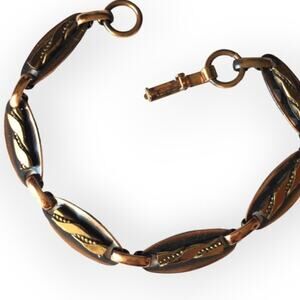 Copper tone abstract design link bracelet